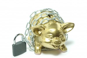 piggy bank wrapped in chains